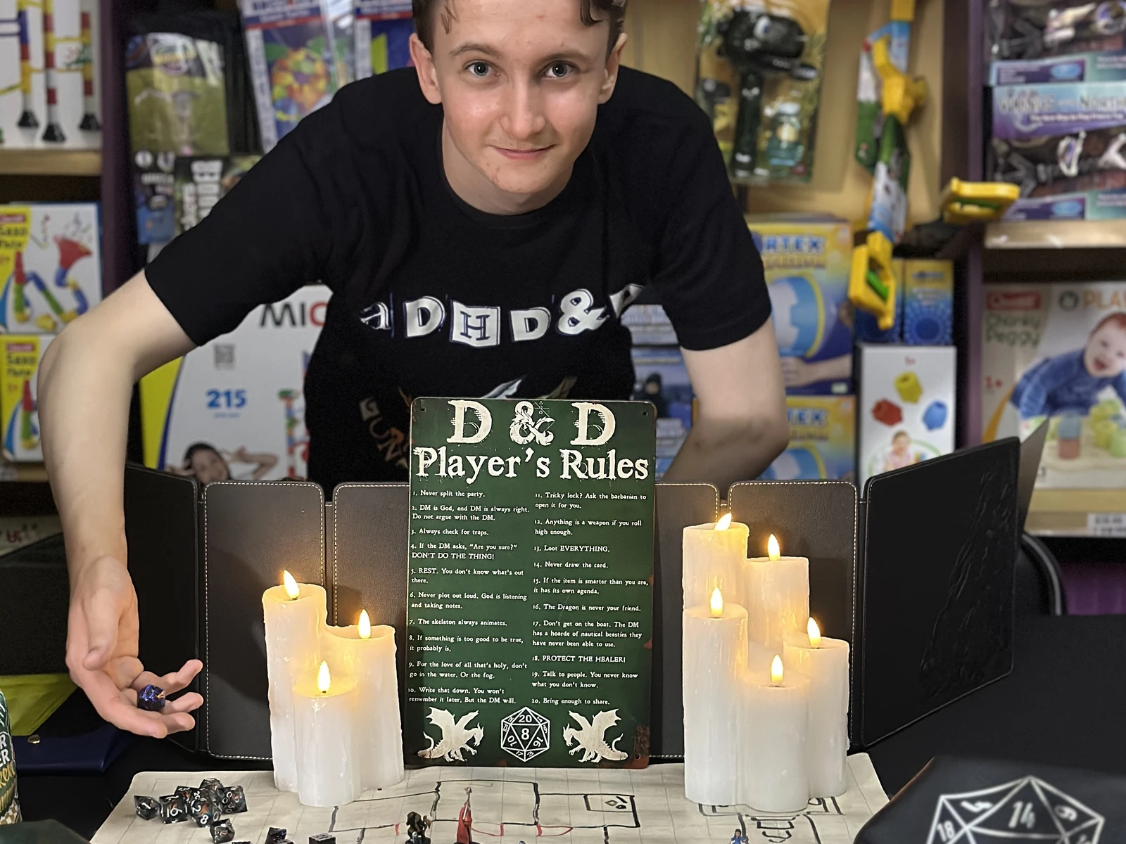 Zaden running a prepared D&D table at Professor Plums in Crows Nest